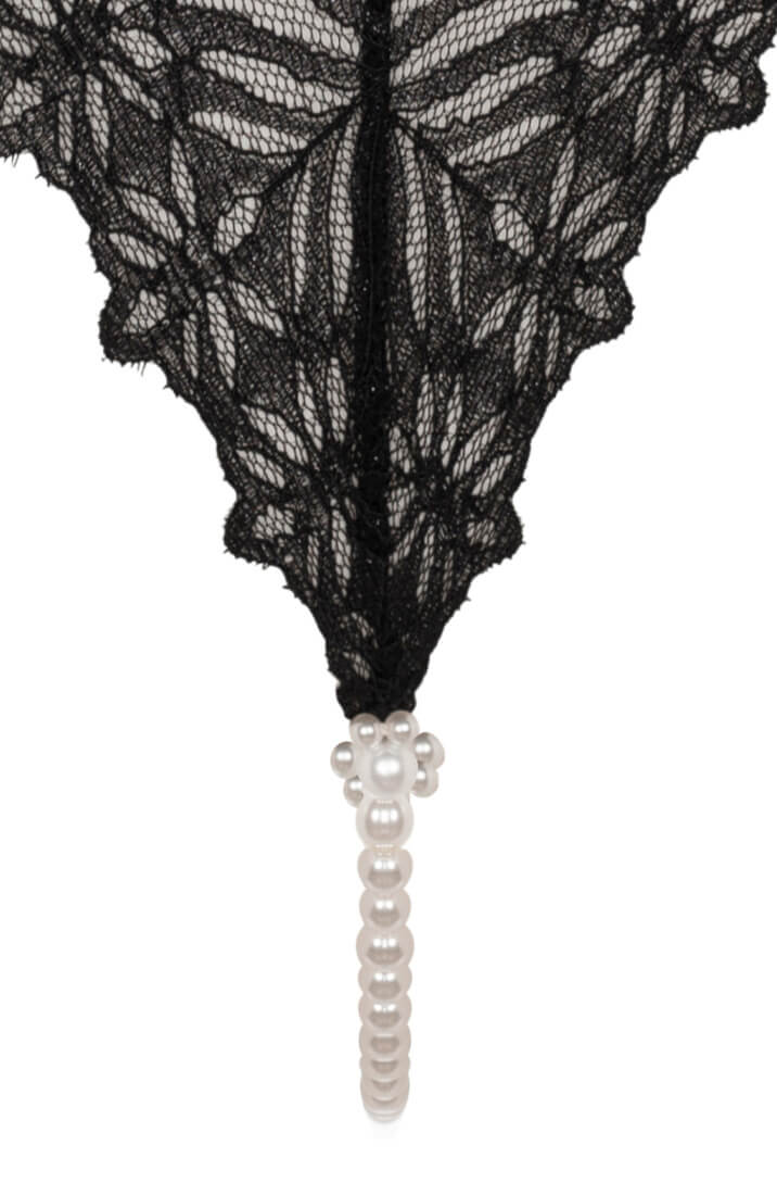 Fræk sort stringtrusse med hvid perlesnor mellem benene - COAX Copenhagen